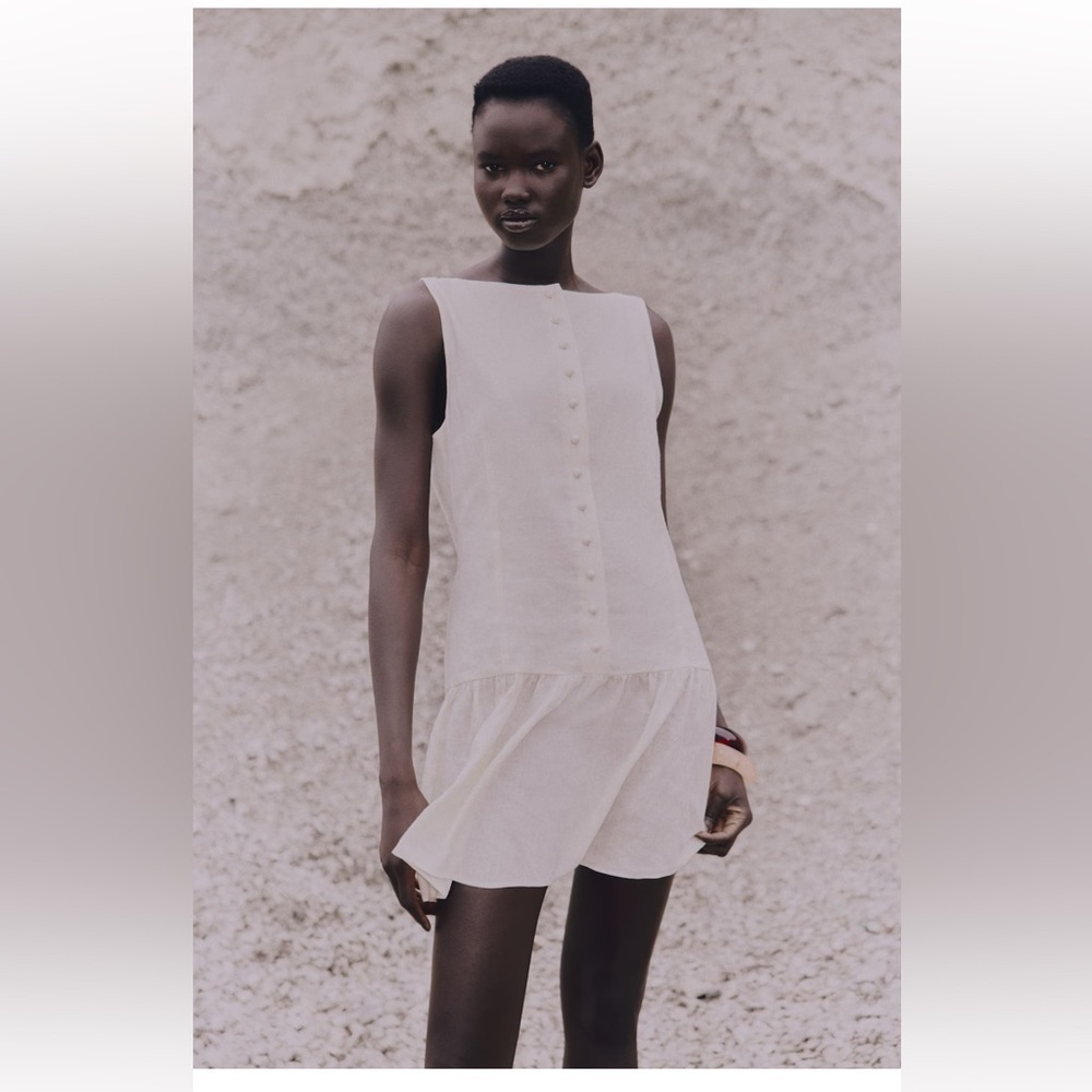 Elegant Cream Sleeveless Dress